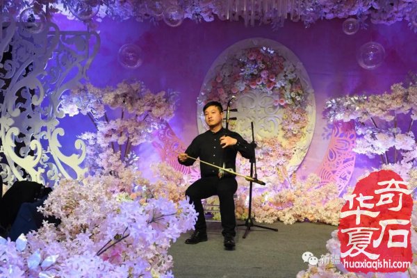 新疆观赏石协会举办喜迎三八猪石赏析音乐会